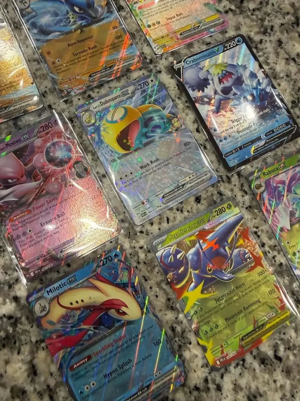 Lot of 9 Assorted Pokémon Trading Cards featuring EX, V, and Tera variants